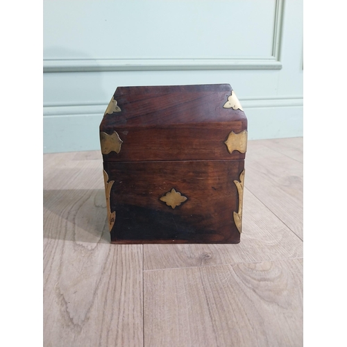 125 - Mahogany and brass bound box with fitted interior. {18 cm H x 15 cm W x 15 cm D}.