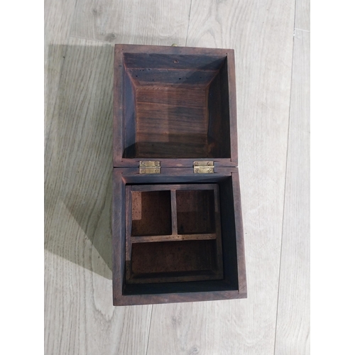 125 - Mahogany and brass bound box with fitted interior. {18 cm H x 15 cm W x 15 cm D}.