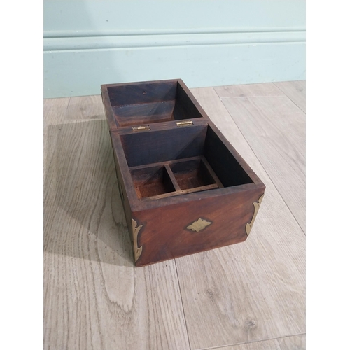 125 - Mahogany and brass bound box with fitted interior. {18 cm H x 15 cm W x 15 cm D}.