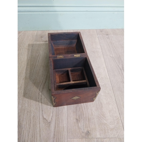 125 - Mahogany and brass bound box with fitted interior. {18 cm H x 15 cm W x 15 cm D}.