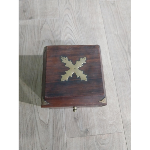 125 - Mahogany and brass bound box with fitted interior. {18 cm H x 15 cm W x 15 cm D}.