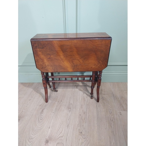 126 - Edwardian walnut Sunderland table on turned supports turned stretcher and shaped feet. {63 cm H x 59... 