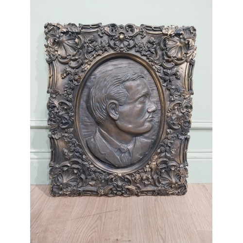 127 - Ornamental moulded cast plaque of Padraic Pearse. {60 cm H x 50 cm W}.