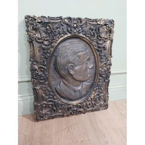 127 - Ornamental moulded cast plaque of Padraic Pearse. {60 cm H x 50 cm W}.