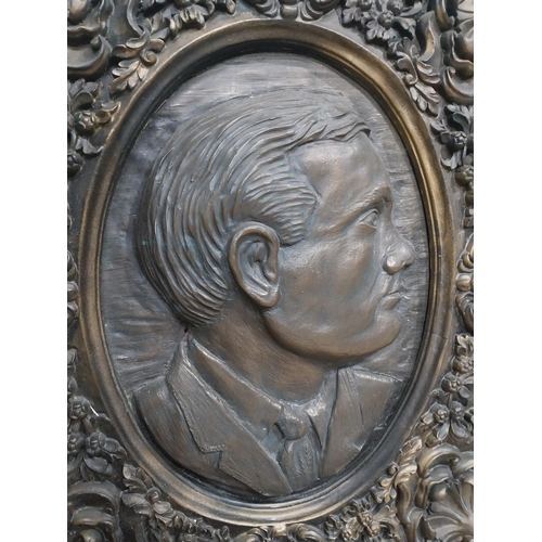 127 - Ornamental moulded cast plaque of Padraic Pearse. {60 cm H x 50 cm W}.