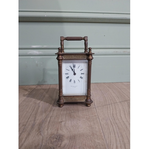 128 - Victorian brass carriage clock by Mackay Dundee {14 cm H x 8 cm W x 7 cm D}.