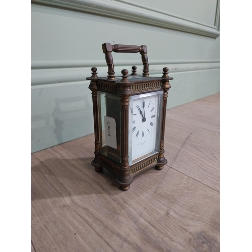 128 - Victorian brass carriage clock by Mackay Dundee {14 cm H x 8 cm W x 7 cm D}.