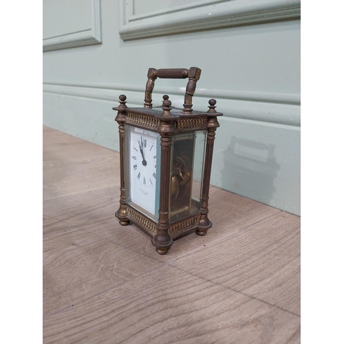 128 - Victorian brass carriage clock by Mackay Dundee {14 cm H x 8 cm W x 7 cm D}.