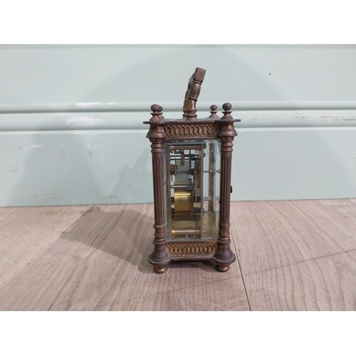 128 - Victorian brass carriage clock by Mackay Dundee {14 cm H x 8 cm W x 7 cm D}.