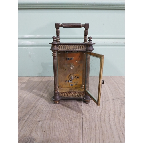 128 - Victorian brass carriage clock by Mackay Dundee {14 cm H x 8 cm W x 7 cm D}.