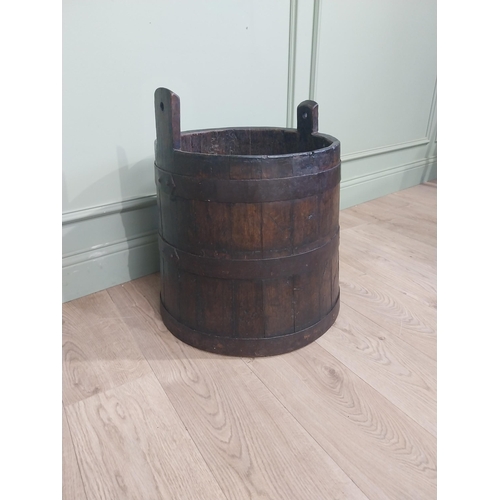 129 - 19th C. Oak and metal bound log bucket. {60 cm H x 50 cm Dia.}.