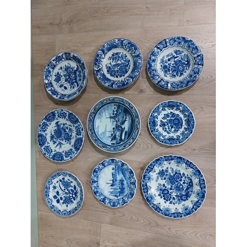 130 - Nine 19th C. Blue and white Dutch ceramic plates with boating and floral scenes. {Largest 30 cm Dia.... 