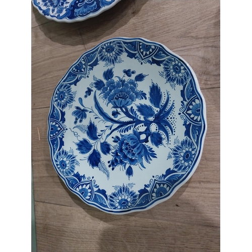 130 - Nine 19th C. Blue and white Dutch ceramic plates with boating and floral scenes. {Largest 30 cm Dia.... 