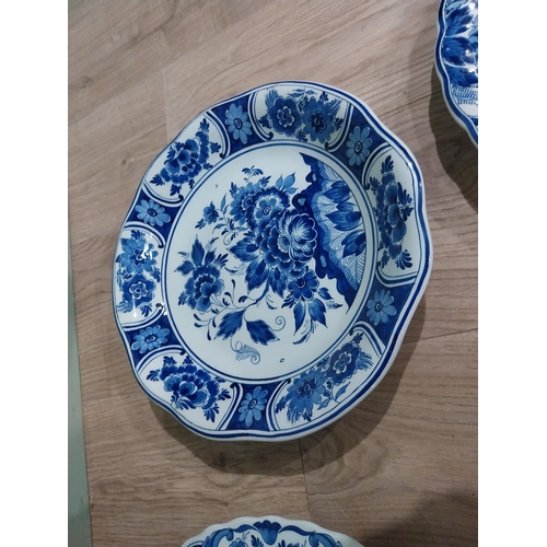 130 - Nine 19th C. Blue and white Dutch ceramic plates with boating and floral scenes. {Largest 30 cm Dia.... 