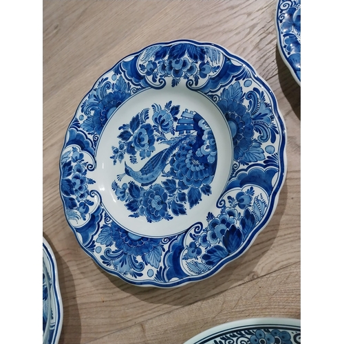 130 - Nine 19th C. Blue and white Dutch ceramic plates with boating and floral scenes. {Largest 30 cm Dia.... 