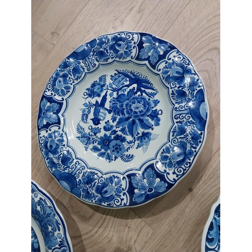 130 - Nine 19th C. Blue and white Dutch ceramic plates with boating and floral scenes. {Largest 30 cm Dia.... 