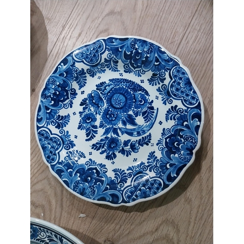 130 - Nine 19th C. Blue and white Dutch ceramic plates with boating and floral scenes. {Largest 30 cm Dia.... 