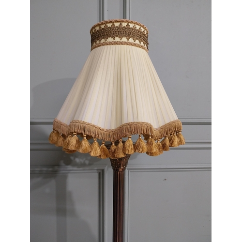 138 - 1950�s brass Corinthian column standard lamp with cloth shade. {163 cm H x 42 cm Dia.}.