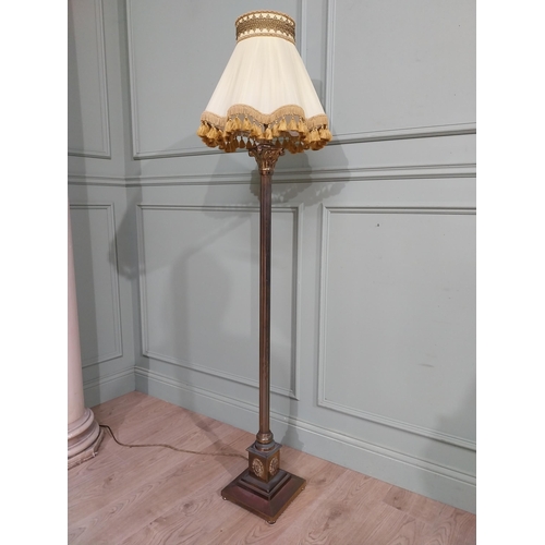 138 - 1950�s brass Corinthian column standard lamp with cloth shade. {163 cm H x 42 cm Dia.}.