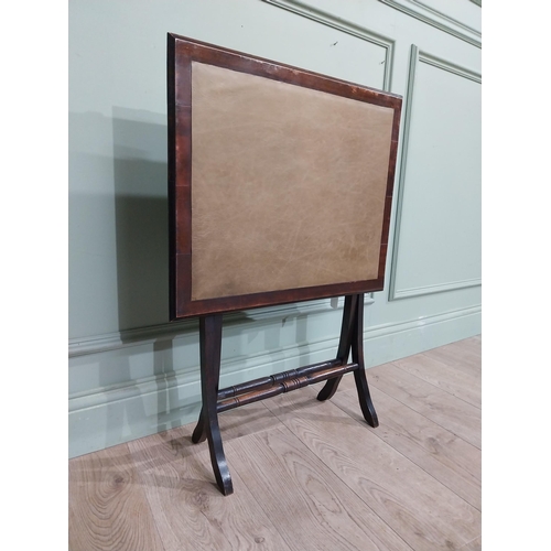 14 - Mahogany folding card table with leather inset on x-frame with two turned stretchers. {70 cm H x 50 ... 