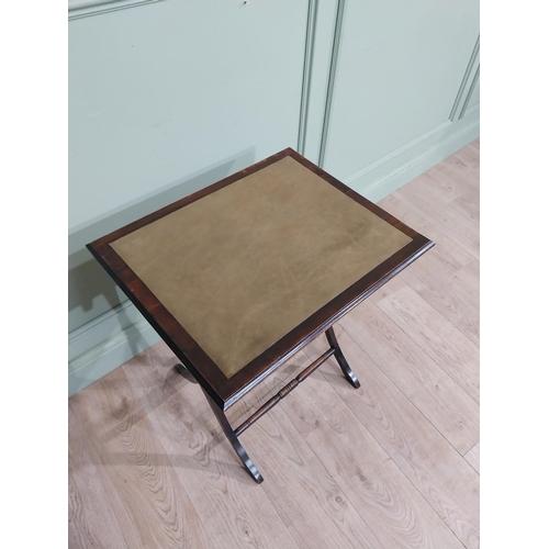 14 - Mahogany folding card table with leather inset on x-frame with two turned stretchers. {70 cm H x 50 ... 