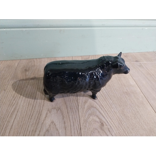 142 - Beswick ceramic model of Bull {11 cm H x 19 cm W x 5 cm D}.