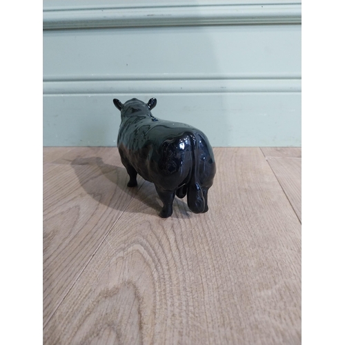 142 - Beswick ceramic model of Bull {11 cm H x 19 cm W x 5 cm D}.