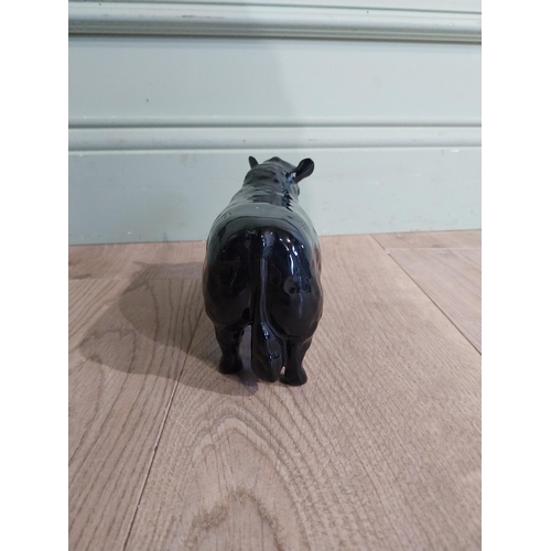 142 - Beswick ceramic model of Bull {11 cm H x 19 cm W x 5 cm D}.