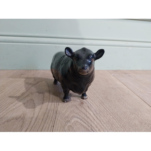 142 - Beswick ceramic model of Bull {11 cm H x 19 cm W x 5 cm D}.