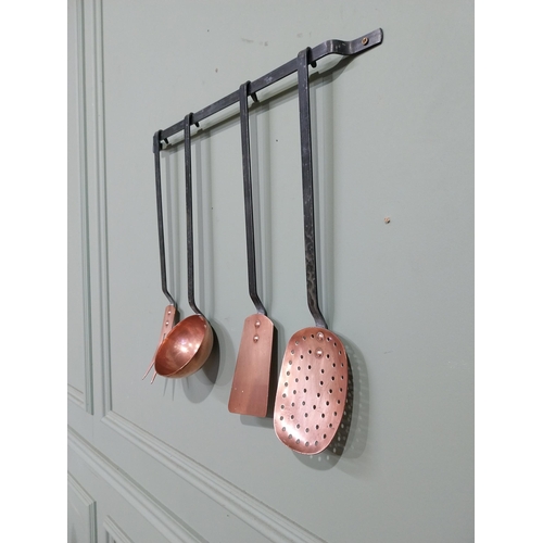 144 - Good quality set of early 20th C. Copper and wrought iron kitchen utensils on bracket. {46 cm H x 49... 