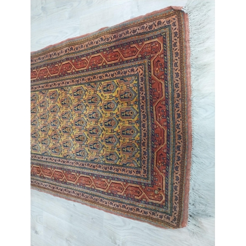 145 - Antique Usak decorative carpet runner. {383 cm L x 90 cm W}.