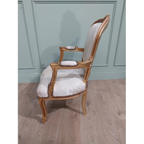 150A - French giltwood upholstered open armchair in the Victorian style. {90 cm H x 61 cm W x 64 cm D}.