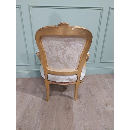 150A - French giltwood upholstered open armchair in the Victorian style. {90 cm H x 61 cm W x 64 cm D}.