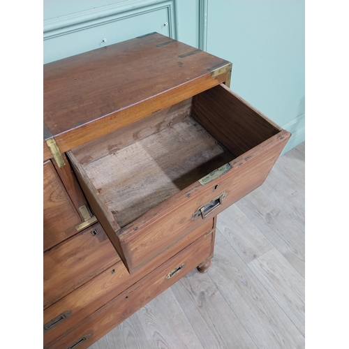 151 - Camphorwood Campaign chest with brass mounts with two short drawers above three long drawers. {101 c... 