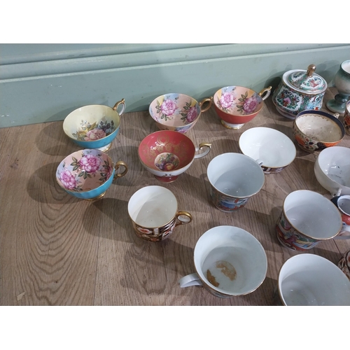 166 - Large collection of assorted tea cups, saucers, egg cups and vases  including some Crown Derby, Ayns... 