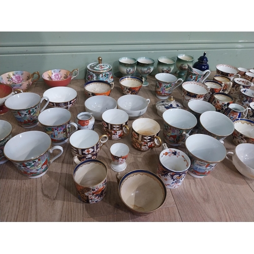 166 - Large collection of assorted tea cups, saucers, egg cups and vases  including some Crown Derby, Ayns... 