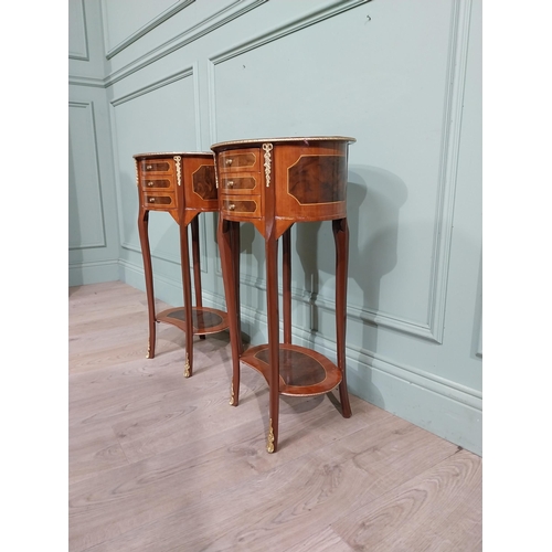 17 - Pair of French kingwood and walnut bedside lockers with ormolu mounts. {70 cm H x 40 cm W x 30 cm D}... 