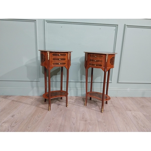 17 - Pair of French kingwood and walnut bedside lockers with ormolu mounts. {70 cm H x 40 cm W x 30 cm D}... 