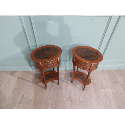 17 - Pair of French kingwood and walnut bedside lockers with ormolu mounts. {70 cm H x 40 cm W x 30 cm D}... 