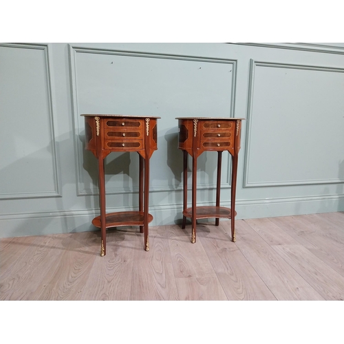 17 - Pair of French kingwood and walnut bedside lockers with ormolu mounts. {70 cm H x 40 cm W x 30 cm D}... 