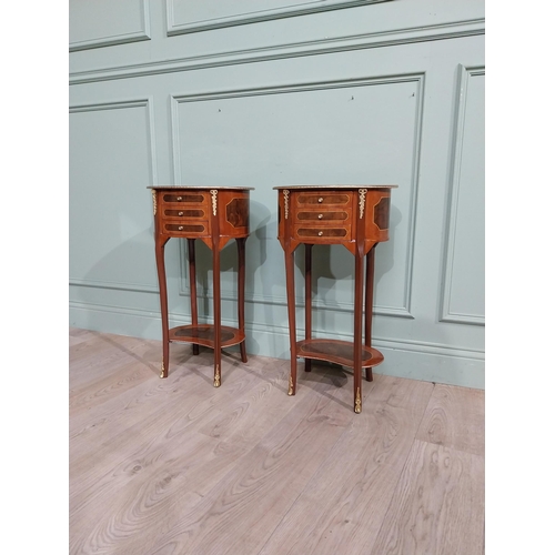 17 - Pair of French kingwood and walnut bedside lockers with ormolu mounts. {70 cm H x 40 cm W x 30 cm D}... 