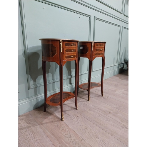 17 - Pair of French kingwood and walnut bedside lockers with ormolu mounts. {70 cm H x 40 cm W x 30 cm D}... 