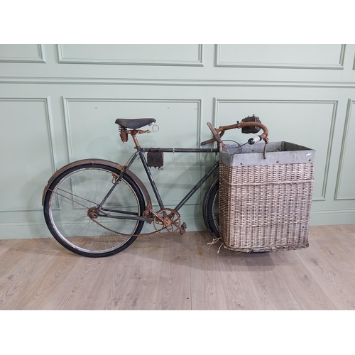 175 - Early 20th C. Messenger bicycle with wicker basket. {97 cm H x 170 cm W x 66 cm D}.