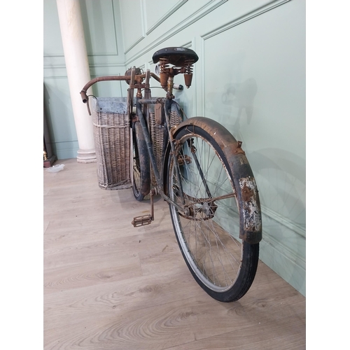 175 - Early 20th C. Messenger bicycle with wicker basket. {97 cm H x 170 cm W x 66 cm D}.