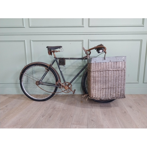 175 - Early 20th C. Messenger bicycle with wicker basket. {97 cm H x 170 cm W x 66 cm D}.