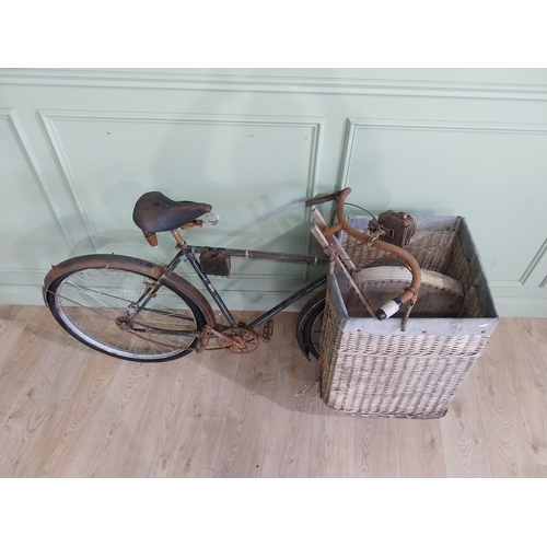 175 - Early 20th C. Messenger bicycle with wicker basket. {97 cm H x 170 cm W x 66 cm D}.