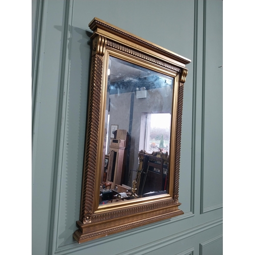 183 - Gilt wall mirror in the Victorian style. {101 cm H x 71 cm W}.