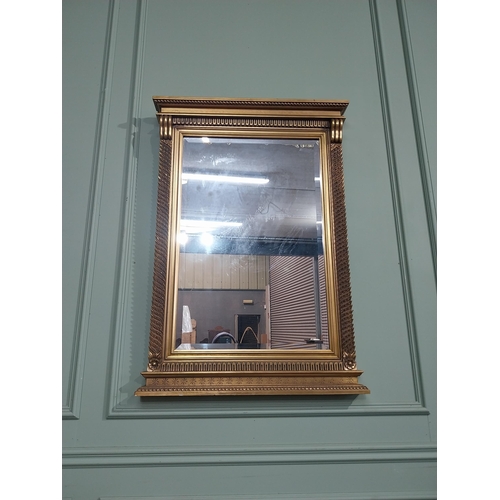 183 - Gilt wall mirror in the Victorian style. {101 cm H x 71 cm W}.