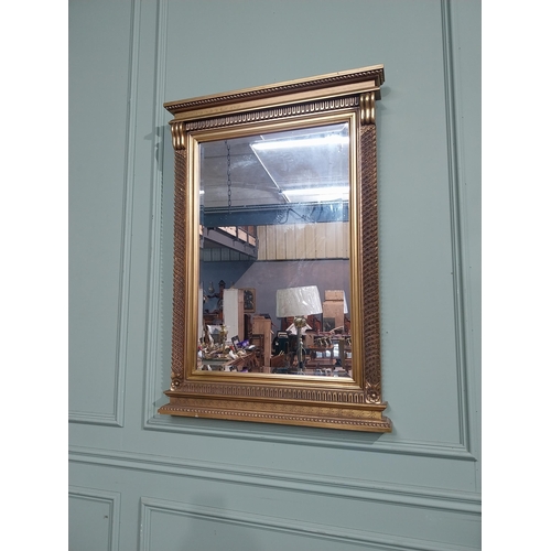 183 - Gilt wall mirror in the Victorian style. {101 cm H x 71 cm W}.