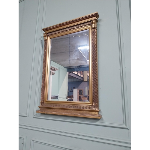 183 - Gilt wall mirror in the Victorian style. {101 cm H x 71 cm W}.